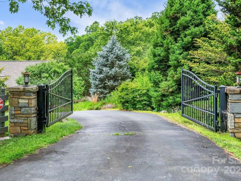 1236 Upper Brush Creek Road, Fairview, NC 28730.  MLS# CAR4233787, YatesRealty ID 13847. Gated entry