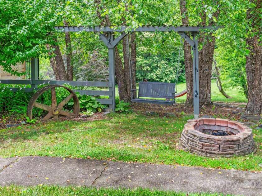 1236 Upper Brush Creek Road, Fairview, NC 28730.  MLS# CAR4233787, YatesRealty ID 13847. Guest house fire pit