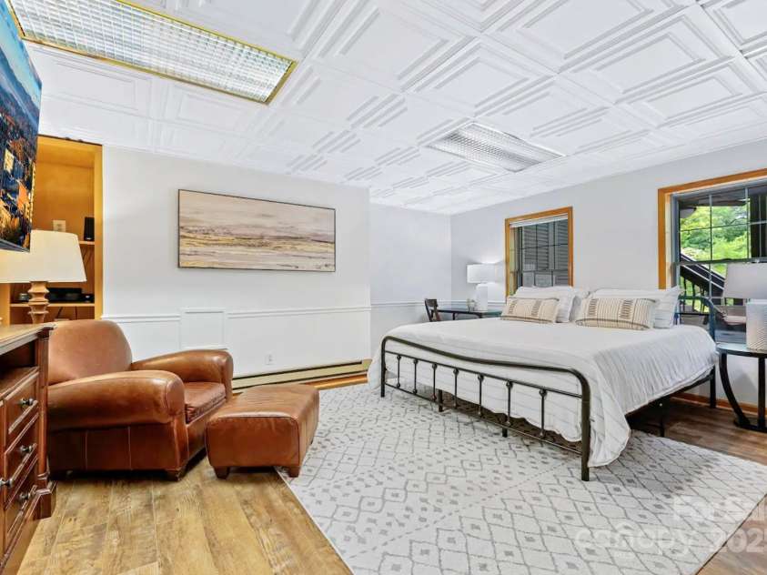 1236 Upper Brush Creek Road, Fairview, NC 28730.  MLS# CAR4233787, YatesRealty ID 13847. Lower level bedroom