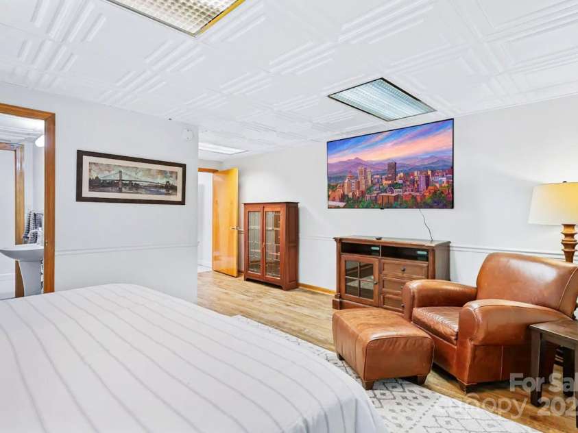 1236 Upper Brush Creek Road, Fairview, NC 28730.  MLS# CAR4233787, YatesRealty ID 13847. Lower level bedroom