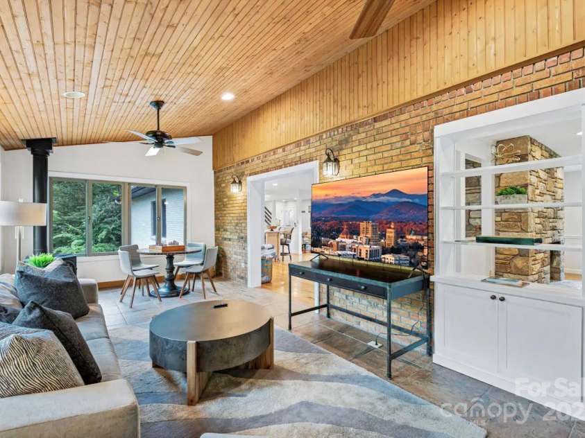 1236 Upper Brush Creek Road, Fairview, NC 28730.  MLS# CAR4233787, YatesRealty ID 13847. Main house sunroom