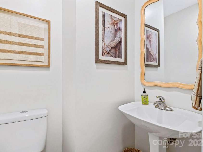 1236 Upper Brush Creek Road, Fairview, NC 28730.  MLS# CAR4233787, YatesRealty ID 13847. Main level powder room