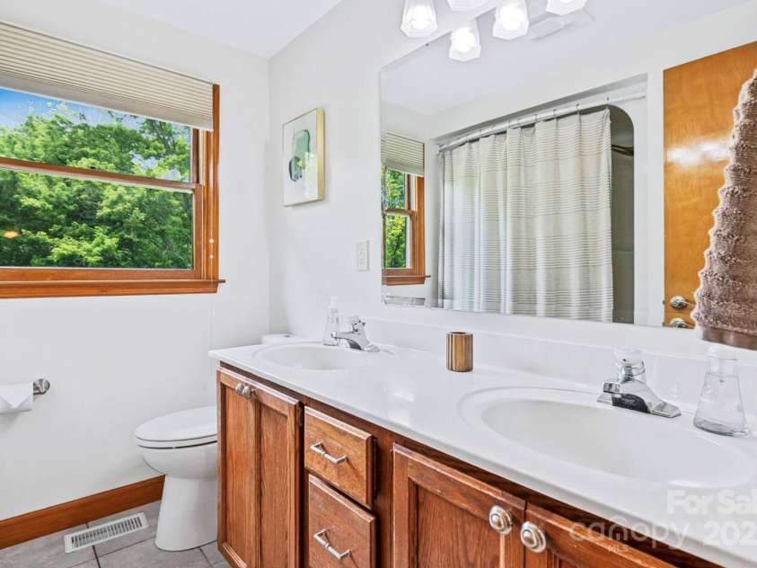 1236 Upper Brush Creek Road, Fairview, NC 28730.  MLS# CAR4233787, YatesRealty ID 13847. Shared upper level bath