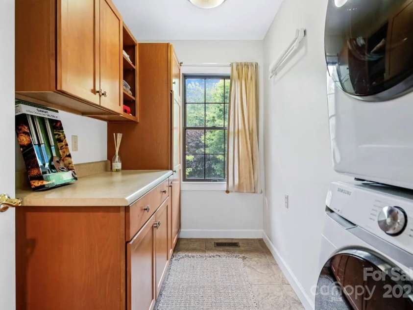 1236 Upper Brush Creek Road, Fairview, NC 28730.  MLS# CAR4233787, YatesRealty ID 13847. Spacious main level laundry