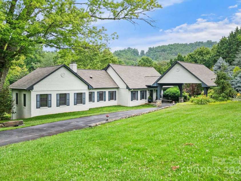 1236 Upper Brush Creek Road, Fairview, NC 28730.  MLS# CAR4233787, YatesRealty ID 13847. View from driveway alongside cottage