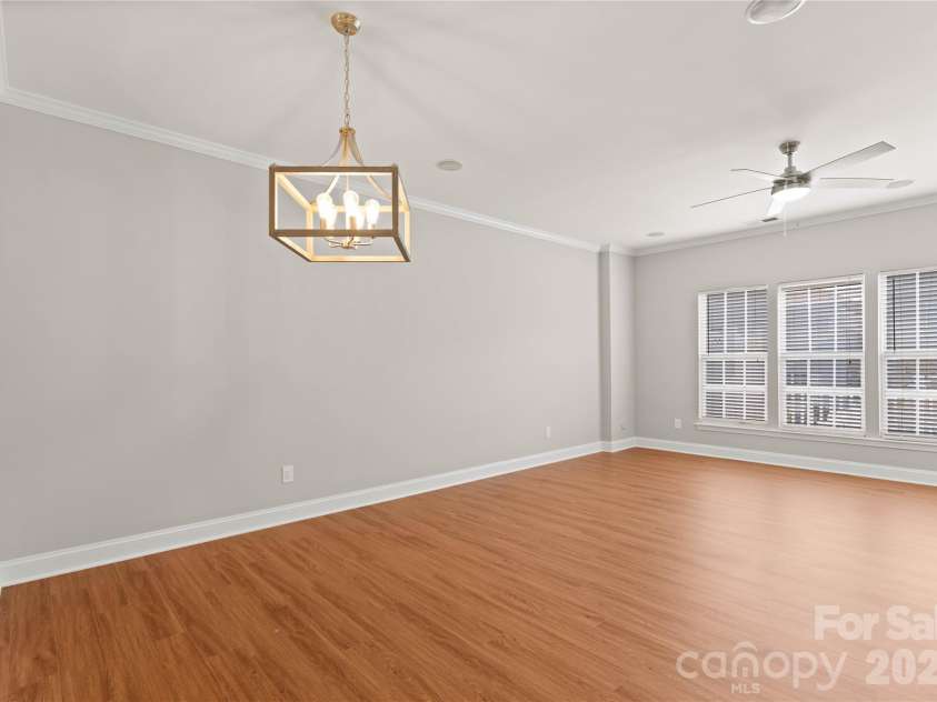 12819 Bullock Greenway Boulevard, Charlotte, NC 28277.  MLS# CAR4357908, YatesRealty ID 13849. Dining area with new lighting. 