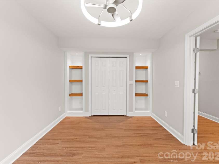 12819 Bullock Greenway Boulevard, Charlotte, NC 28277.  MLS# CAR4357908, YatesRealty ID 13849. Entry level 3rd bedroom/office with custom built-ins and lighting.  