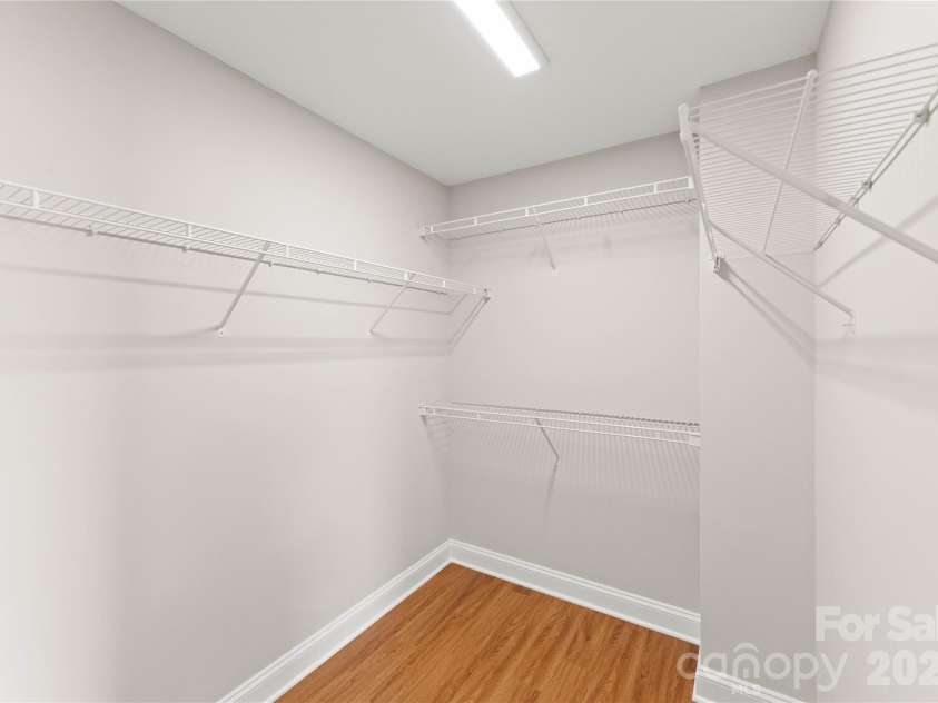12819 Bullock Greenway Boulevard, Charlotte, NC 28277.  MLS# CAR4357908, YatesRealty ID 13849. Primary walk-in closet. 