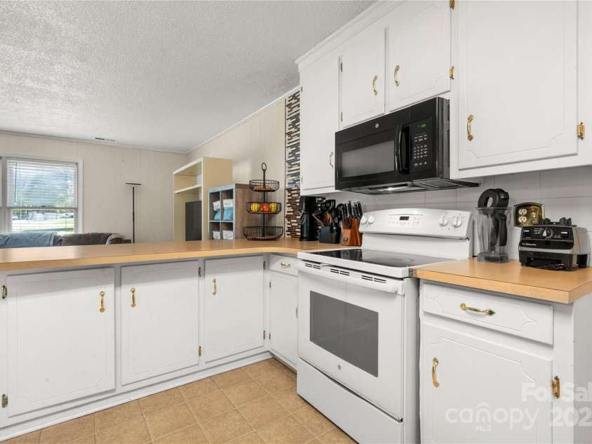 2115 Fowler Secrest Road, Monroe, NC 28110.  MLS# CAR4242797, YatesRealty ID 13850. 