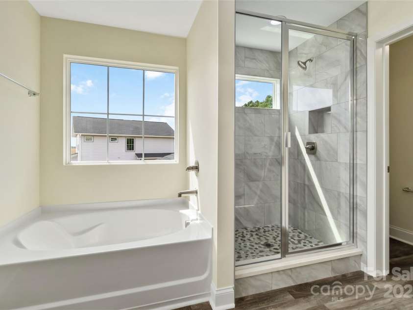 1034 Heath Helms Road, Monroe, NC 28110.  MLS# CAR4310413, YatesRealty ID 1386. Full Bath in Primary Bedroom 