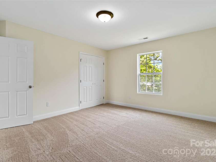 1034 Heath Helms Road, Monroe, NC 28110.  MLS# CAR4310413, YatesRealty ID 1386. Second bedroom 