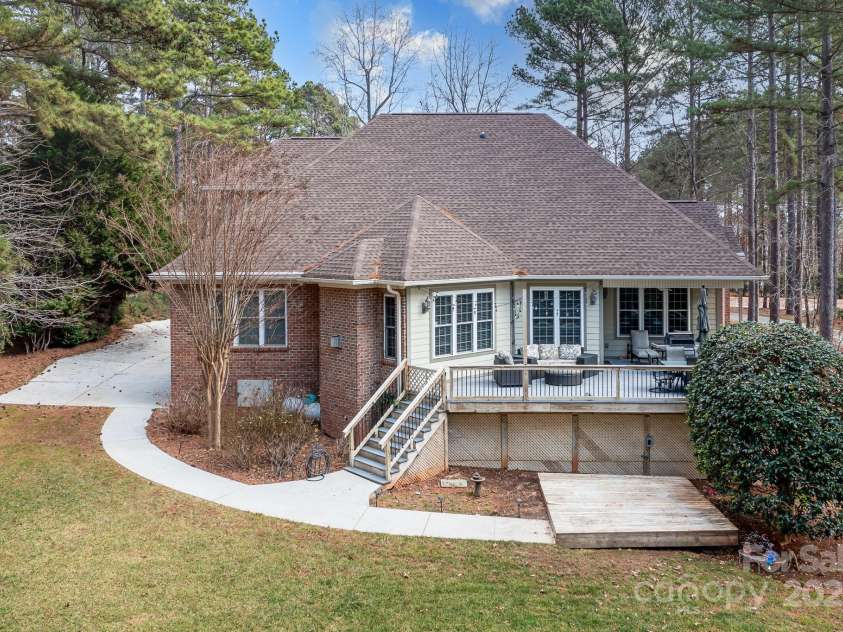 302 McCrary Road, Mooresville, NC 28117.  MLS# CAR4215568, YatesRealty ID 13860. Deck view back of home