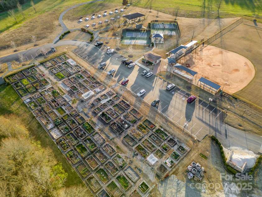 10432 Bethpage Drive, Indian Land, SC 29707.  MLS# CAR4235926, YatesRealty ID 13863. Water's Edge Park is home to one of two community gardens.