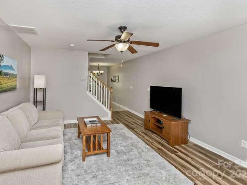 43 Sunny Meadows Boulevard, Arden, NC 28704.  MLS# CAR4249909, YatesRealty ID 13867. Great room freshly painted a light gray.