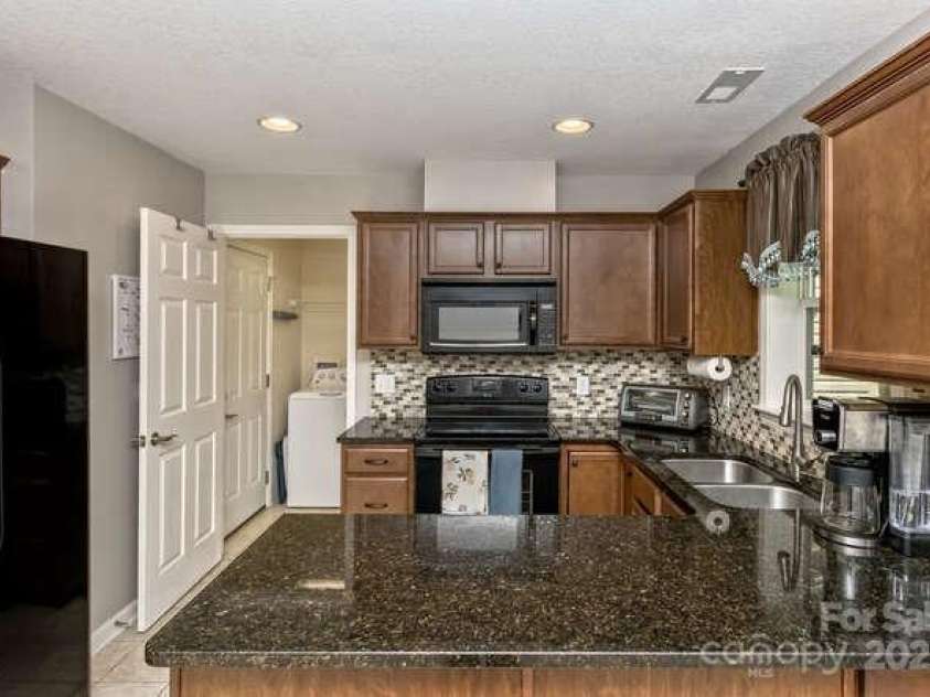 43 Sunny Meadows Boulevard, Arden, NC 28704.  MLS# CAR4249909, YatesRealty ID 13867. Plenty of room for a cook with everything