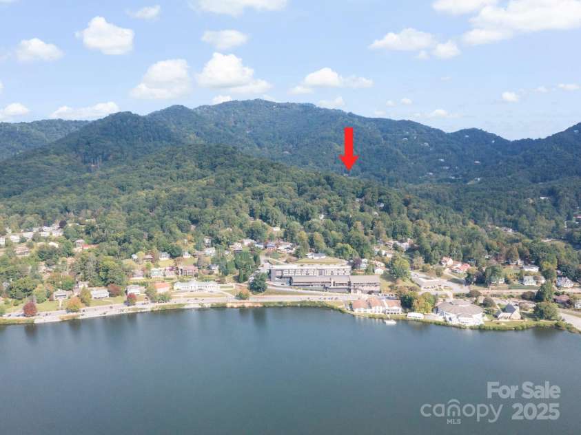 139 Kammerer Drive, Waynesville, NC 28785.  MLS# CAR4302164, YatesRealty ID 1387. Aerial from across the lake (View Not Visible from home)