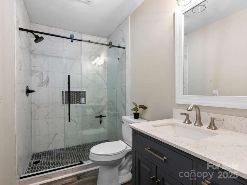 139 Kammerer Drive, Waynesville, NC 28785.  MLS# CAR4302164, YatesRealty ID 1387. Bathroom upstairs