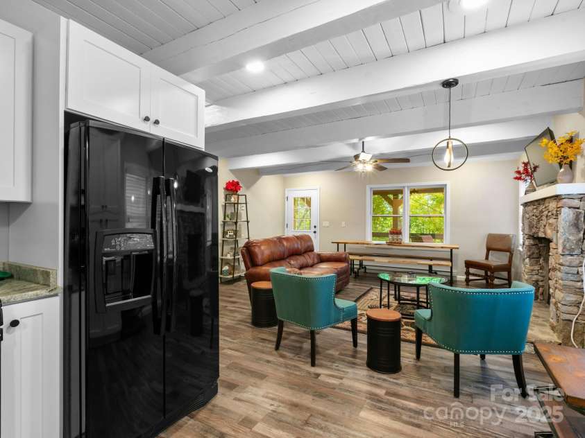 139 Kammerer Drive, Waynesville, NC 28785.  MLS# CAR4302164, YatesRealty ID 1387. Kitchen + Living Room + Dining Area