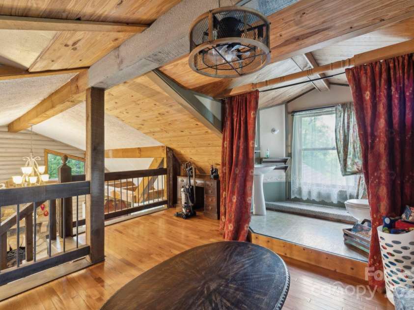 214 Hubert Mccall Road, Balsam Grove, NC 28708.  MLS# CAR4256871, YatesRealty ID 13872. Loft Overlooking the Main Living Area