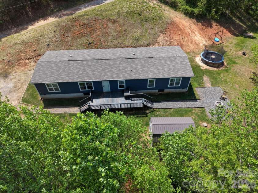 87 Horseback Lane, Marshall, NC 28753.  MLS# CAR4363036, YatesRealty ID 13882. Aerial perspective showcasing privacy and usable outdoor space