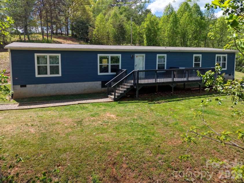 87 Horseback Lane, Marshall, NC 28753.  MLS# CAR4363036, YatesRealty ID 13882. Clean, inviting exterior with plenty of space to make it your own
