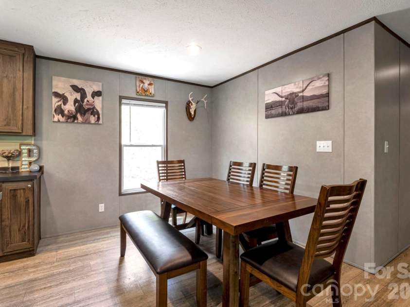 87 Horseback Lane, Marshall, NC 28753.  MLS# CAR4363036, YatesRealty ID 13882. Dedicated dining area perfect for everyday meals or hosting