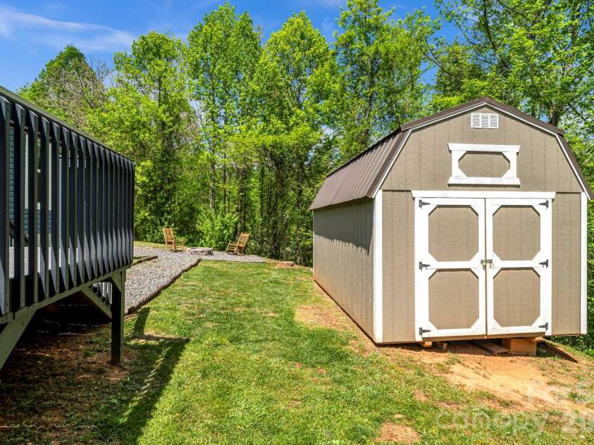 87 Horseback Lane, Marshall, NC 28753.  MLS# CAR4363036, YatesRealty ID 13882. Detached shed adds convenience and functionality to the property
