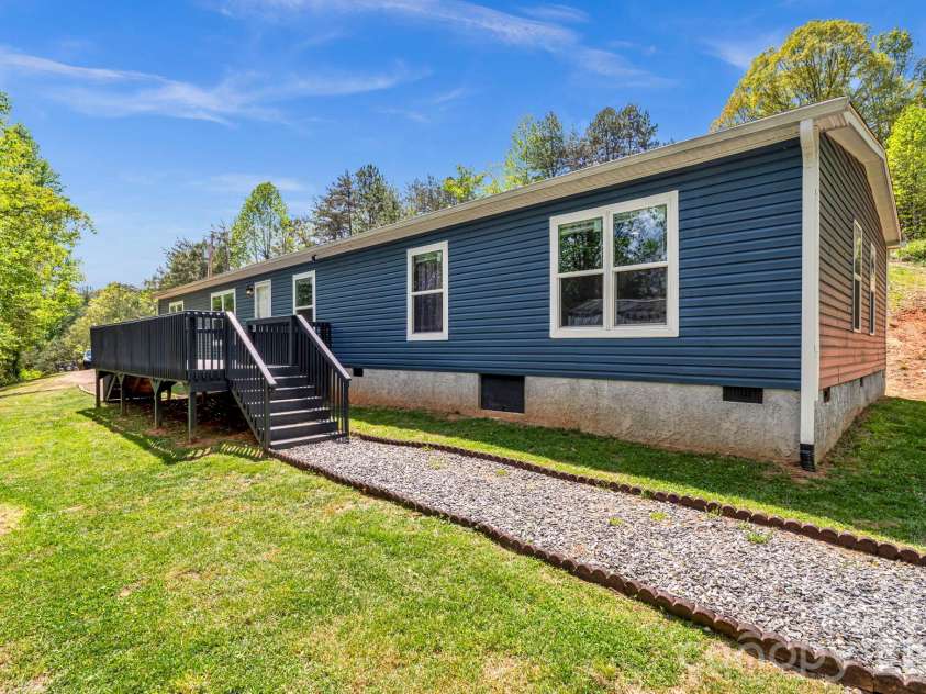 87 Horseback Lane, Marshall, NC 28753.  MLS# CAR4363036, YatesRealty ID 13882. Easy indoor-outdoor flow with functional yard space