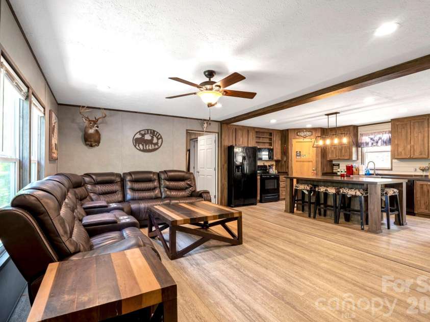 87 Horseback Lane, Marshall, NC 28753.  MLS# CAR4363036, YatesRealty ID 13882. Front door entry with easy flow into the main living space