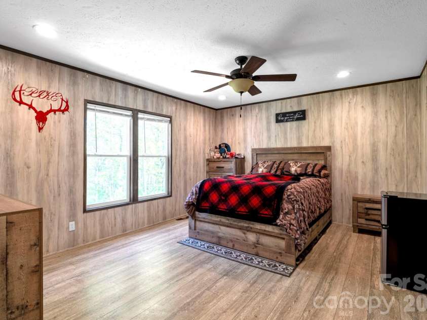 87 Horseback Lane, Marshall, NC 28753.  MLS# CAR4363036, YatesRealty ID 13882. Generous primary suite designed for comfort and convenience