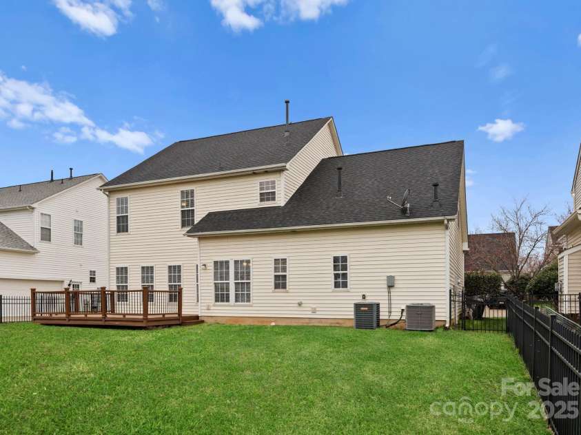 8806 Cool Meadow Drive, Huntersville, NC 28078.  MLS# CAR4232854, YatesRealty ID 13886. Fully fence backyard overlooking private dairy farm.