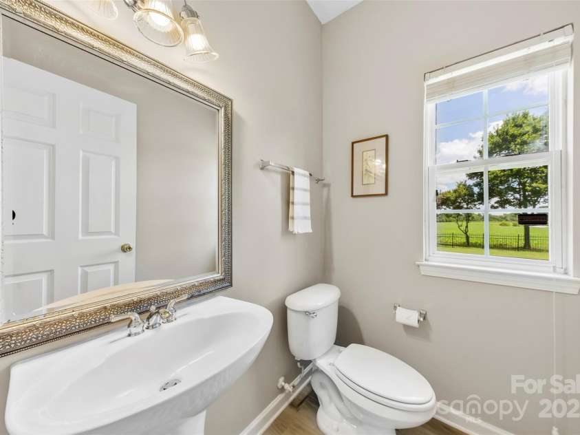 8806 Cool Meadow Drive, Huntersville, NC 28078.  MLS# CAR4232854, YatesRealty ID 13886. Powder room on main level.