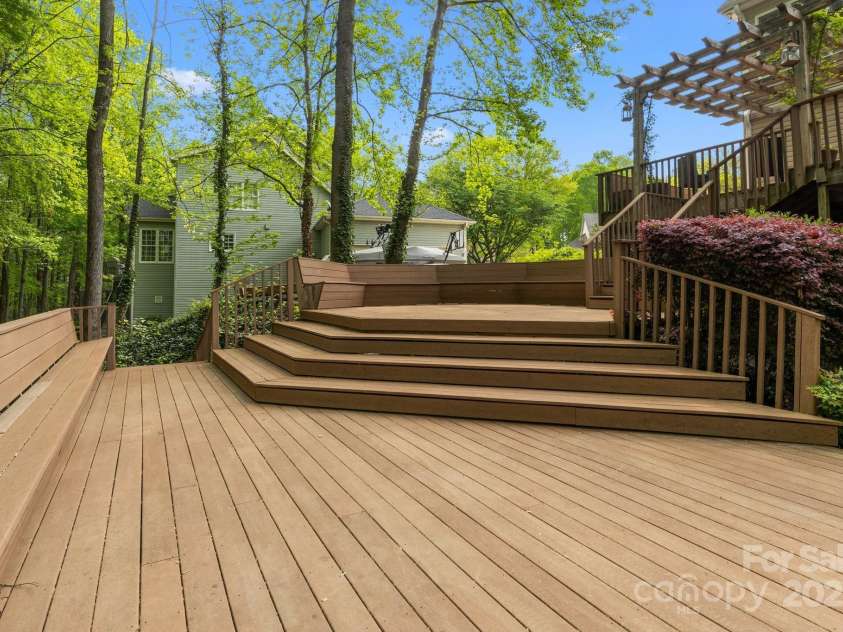 263 Fernbrook Drive, Mooresville, NC 28117.  MLS# CAR4246852, YatesRealty ID 13887. 3-Tiered Deck with Built-In Seating