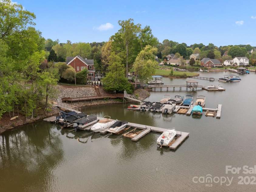 263 Fernbrook Drive, Mooresville, NC 28117.  MLS# CAR4246852, YatesRealty ID 13887. Great location on Lake Norman - At the end of a quite cove but minutes to the main channel.