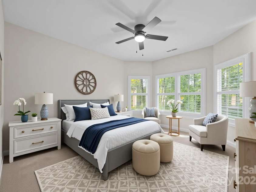 263 Fernbrook Drive, Mooresville, NC 28117.  MLS# CAR4246852, YatesRealty ID 13887. Guest Suite - Beautiful bay windows let in lots of light and seasonal lake views. -(Virtually Staged)