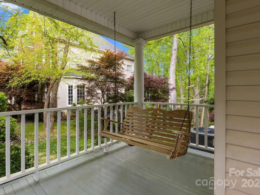 263 Fernbrook Drive, Mooresville, NC 28117.  MLS# CAR4246852, YatesRealty ID 13887. Rocking Swing on Wrap-Around Front Porch