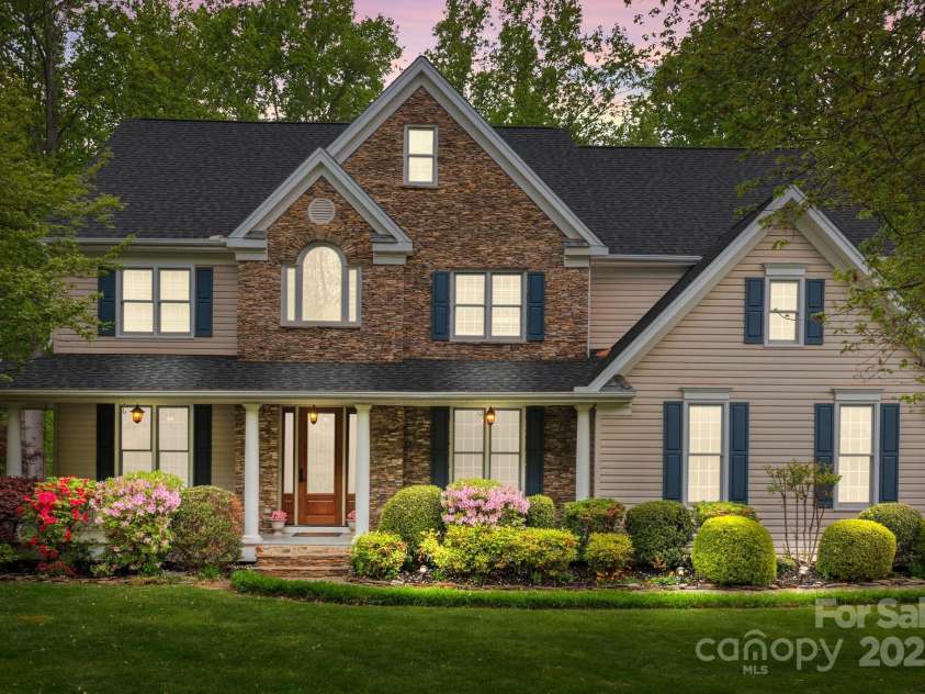 263 Fernbrook Drive, Mooresville, NC 28117.  MLS# CAR4246852, YatesRealty ID 13887. Stately, renovated waterview home in beautiful Fernbrook, Mooresville.