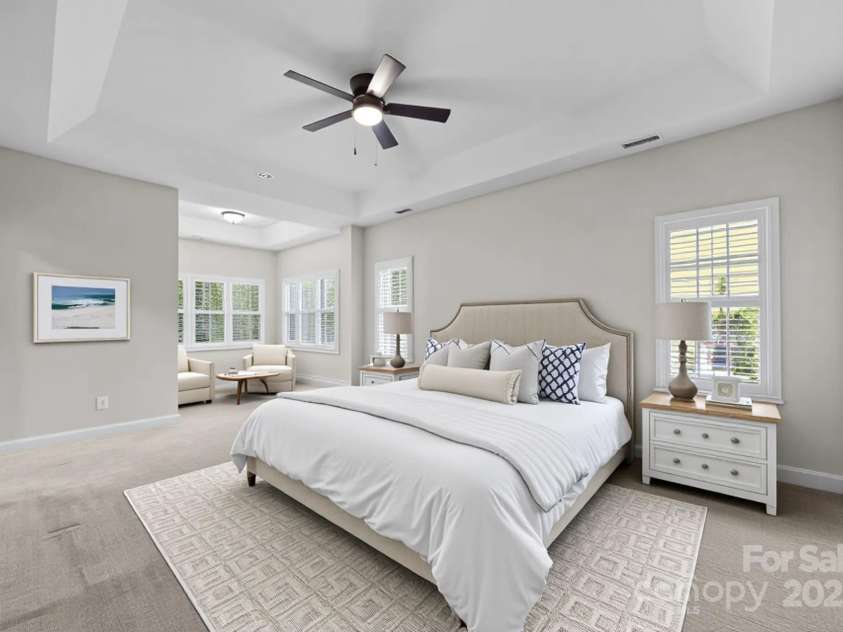 263 Fernbrook Drive, Mooresville, NC 28117.  MLS# CAR4246852, YatesRealty ID 13887. The expansive primary suite with sitting nook. (Virtually Staged)