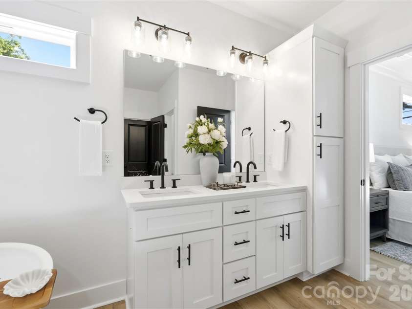 356 Main Street, McAdenville, NC 28101.  MLS# CAR4315707, YatesRealty ID 1389. A true retreat with dual vanities, additional built-in storage