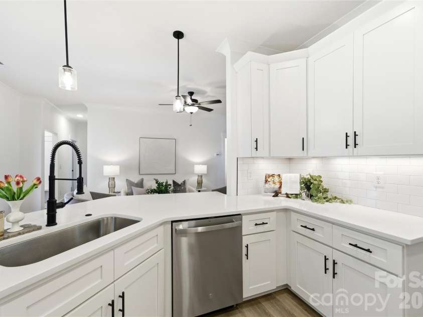 356 Main Street, McAdenville, NC 28101.  MLS# CAR4315707, YatesRealty ID 1389. An inspired kitchen featuring white quartz countertops, Shaker cabinetry, and thoughtful storage throughout