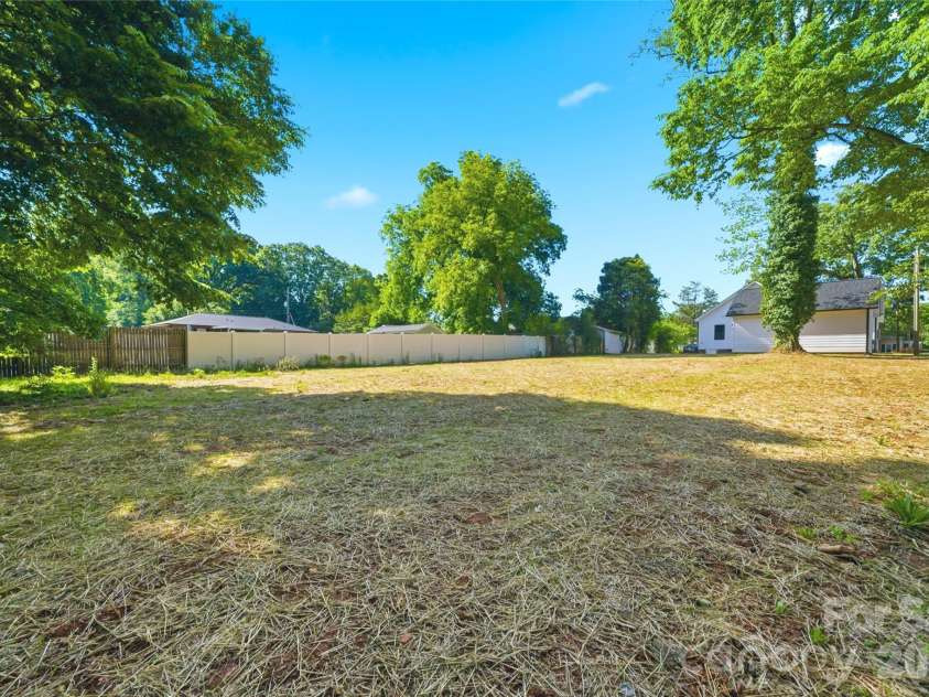 356 Main Street, McAdenville, NC 28101.  MLS# CAR4315707, YatesRealty ID 1389. The generous flat backyard offers the perfect blend of privacy, flexibility, and outdoor enjoyment for every stage of life