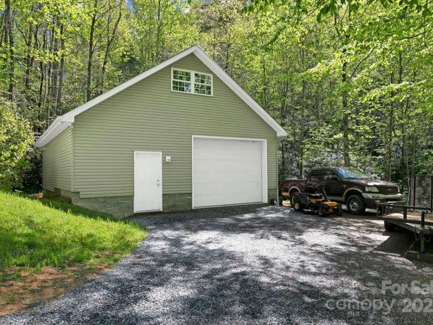 544 Jeter Mountain Road, Penrose, NC 28766.  MLS# CAR4251034, YatesRealty ID 13890. Detached Garage