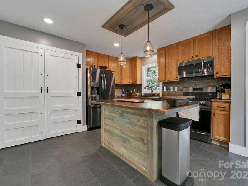 544 Jeter Mountain Road, Penrose, NC 28766.  MLS# CAR4251034, YatesRealty ID 13890. Spacious Kitchen