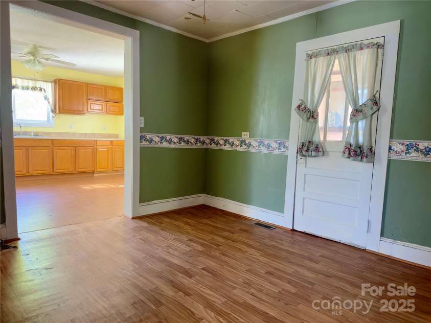 1277 Virginia Road, Marion, NC 28752.  MLS# CAR4244101, YatesRealty ID 13898. Additional view of dining room leading to the kitchen