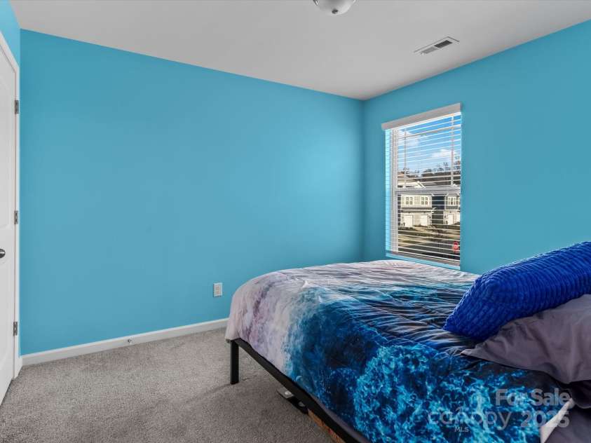 18014 Pear Hawthorne Drive, Huntersville, NC 28078.  MLS# CAR4198859, YatesRealty ID 13899. 13 x 11 ft. Guest bedroom suitable for a king bedroom suite