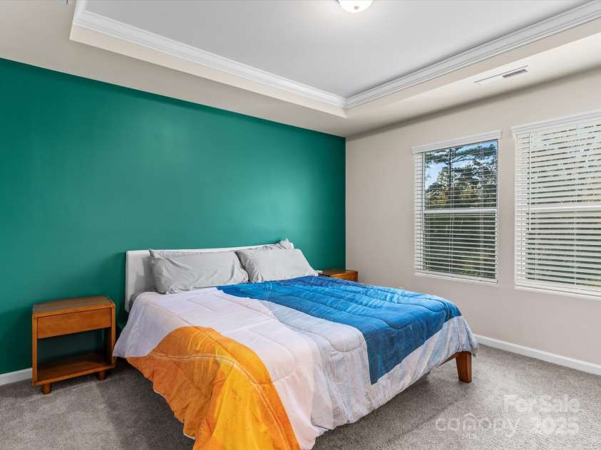 18014 Pear Hawthorne Drive, Huntersville, NC 28078.  MLS# CAR4198859, YatesRealty ID 13899. 13 x 13 ft Primary bedroom suite with plenty of room for a king-sized bed.