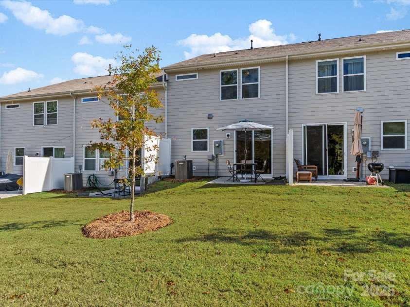 18014 Pear Hawthorne Drive, Huntersville, NC 28078.  MLS# CAR4198859, YatesRealty ID 13899. Back yard view.