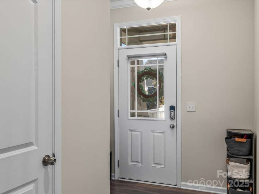 18014 Pear Hawthorne Drive, Huntersville, NC 28078.  MLS# CAR4198859, YatesRealty ID 13899. Built in 2022, this townhome is modern, pristine  and move-in ready.