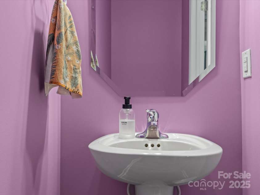 18014 Pear Hawthorne Drive, Huntersville, NC 28078.  MLS# CAR4198859, YatesRealty ID 13899. Powder room on main level