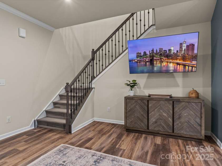 18014 Pear Hawthorne Drive, Huntersville, NC 28078.  MLS# CAR4198859, YatesRealty ID 13899. Stunning stained rails with iron spindles